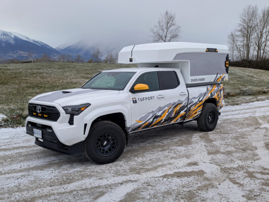 Tufport Overlander on a mid-size Tacoma truck with custom graphics