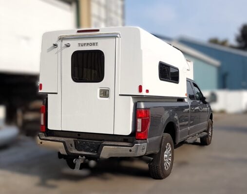 Tufport T62 mounted on a full-size truck with side windows and a single rear door